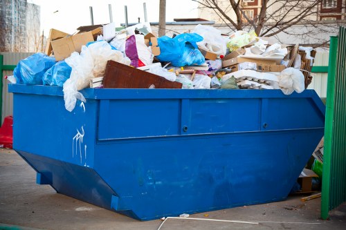 Waste collection truck in Lee